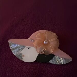 Chic Pink and Black Hat with Floral Design